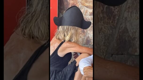 Just casually talking to the wall in a pirate hat….